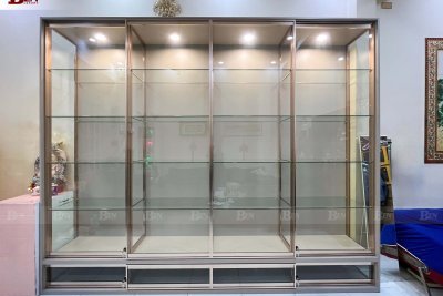 Hoàn Thiện Tủ Cánh Kính Cửa Lùa Ray Âm Khung Nhôm Hồng Bóng Tại Quận 1, TP.HCM